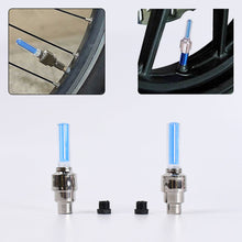 Bicycle tire valve stem cap with blue light on a white background